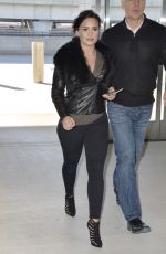 DEMI LOVATO in Tights Arrives at JFK Airport in New York 1203