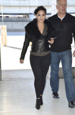DEMI LOVATO in Tights Arrives at JFK Airport in New York 1203