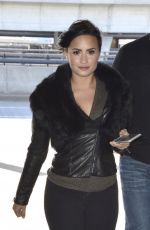 DEMI LOVATO in Tights Arrives at JFK Airport in New York 1203