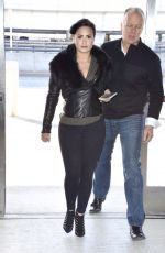 DEMI LOVATO in Tights Arrives at JFK Airport in New York 1203
