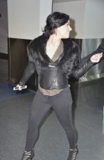 DEMI LOVATO in Tights Arrives at JFK Airport in New York 1203