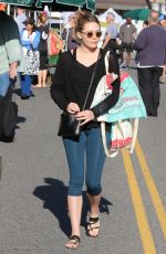 ELIZABETH OLSEN Arrives at Farmer