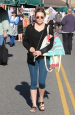 ELIZABETH OLSEN Arrives at Farmer