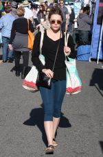 ELIZABETH OLSEN Arrives at Farmer