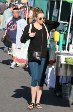 ELIZABETH OLSEN Arrives at Farmer