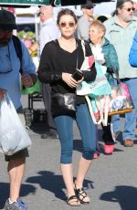 ELIZABETH OLSEN Arrives at Farmer
