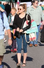 ELIZABETH OLSEN Arrives at Farmer