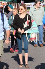 ELIZABETH OLSEN Arrives at Farmer