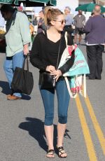 ELIZABETH OLSEN Arrives at Farmer