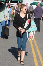 ELIZABETH OLSEN Arrives at Farmer