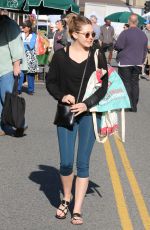 ELIZABETH OLSEN Arrives at Farmer