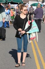 ELIZABETH OLSEN Arrives at Farmer