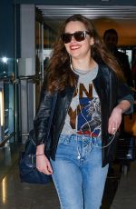 EMILIA CLARKE Arrives at Heathrow Airport in London 2003