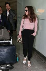 EMILIA CLARKE at Heathrow Airport in London