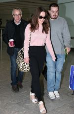 EMILIA CLARKE at Heathrow Airport in London