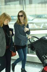 EMILY BLUNT Arrives at Heathrow Airport in London