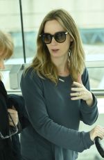 EMILY BLUNT Arrives at Heathrow Airport in London