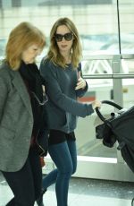 EMILY BLUNT Arrives at Heathrow Airport in London