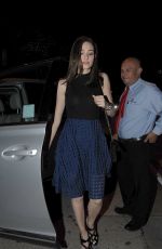 EMMY ROSSUM Arrives at Craig
