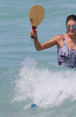 DOUTZEN KROES in Swimsuit at a Beach in Miami