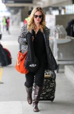 JULIA STILES Arrives at Los Angeles International Airport