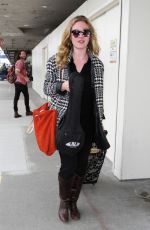 JULIA STILES Arrives at Los Angeles International Airport