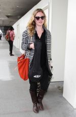 JULIA STILES Arrives at Los Angeles International Airport