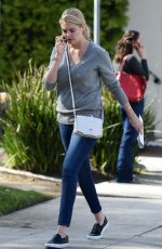 KATE UPTON Leaves an Office in Los Angeles