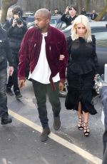 KIM KARDASHIAN and Kanye West at Louis Vuitton Fashion Show in Paris