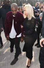 KIM KARDASHIAN and Kanye West at Louis Vuitton Fashion Show in Paris