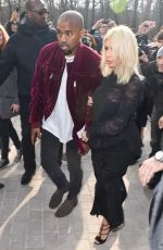 KIM KARDASHIAN and Kanye West at Louis Vuitton Fashion Show in Paris