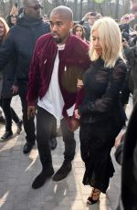 KIM KARDASHIAN and Kanye West at Louis Vuitton Fashion Show in Paris