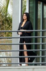 KYLIE JENNER in Cutout Swimsuit on the Set of a Photoshoot in Hollywood