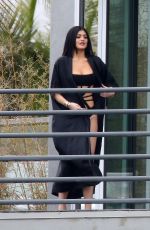 KYLIE JENNER in Cutout Swimsuit on the Set of a Photoshoot in Hollywood