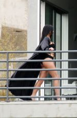 KYLIE JENNER in Cutout Swimsuit on the Set of a Photoshoot in Hollywood