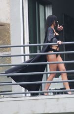 KYLIE JENNER in Cutout Swimsuit on the Set of a Photoshoot in Hollywood