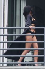 KYLIE JENNER in Cutout Swimsuit on the Set of a Photoshoot in Hollywood