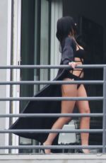 KYLIE JENNER in Cutout Swimsuit on the Set of a Photoshoot in Hollywood
