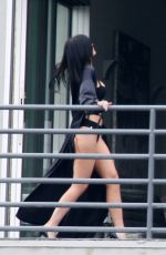 KYLIE JENNER in Cutout Swimsuit on the Set of a Photoshoot in Hollywood