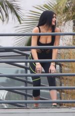 KYLIE JENNER in Cutout Swimsuit on the Set of a Photoshoot in Hollywood