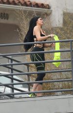 KYLIE JENNER in Cutout Swimsuit on the Set of a Photoshoot in Hollywood