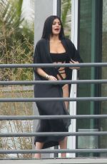 KYLIE JENNER in Cutout Swimsuit on the Set of a Photoshoot in Hollywood