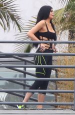 KYLIE JENNER in Cutout Swimsuit on the Set of a Photoshoot in Hollywood