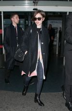 LILY COLLINS at Charles De Gaulle Airport in Paris 0503