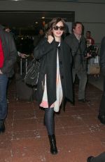 LILY COLLINS at Charles De Gaulle Airport in Paris 0503