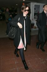 LILY COLLINS at Charles De Gaulle Airport in Paris 0503