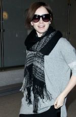 LILY COLLINS at LAX Airport in Los Angeles 0703