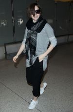 LILY COLLINS at LAX Airport in Los Angeles 0703