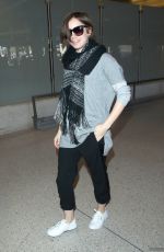 LILY COLLINS at LAX Airport in Los Angeles 0703