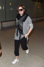 LILY COLLINS at LAX Airport in Los Angeles 0703